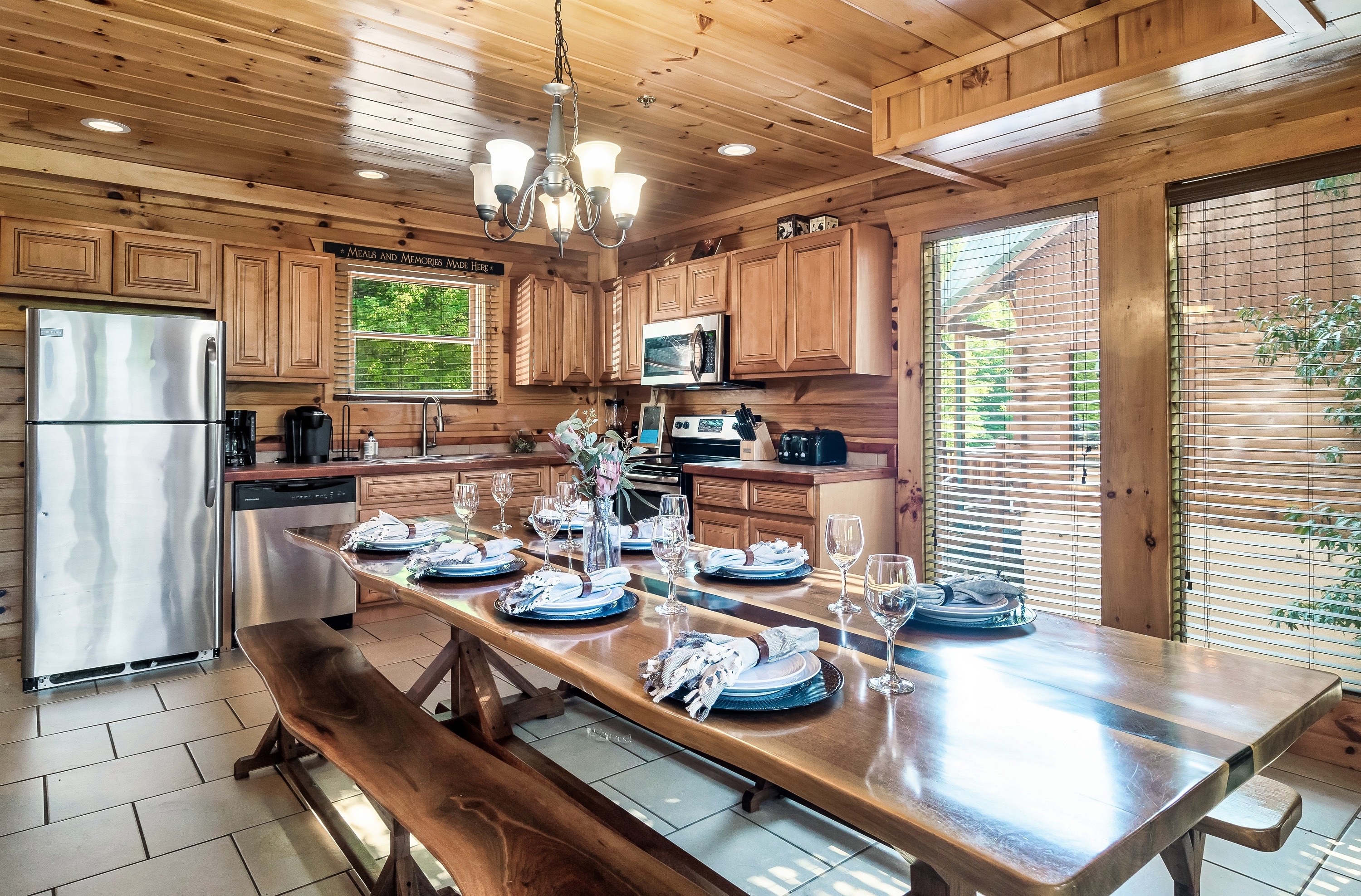 Dining table and kitchen at Alpine Sky Cabin